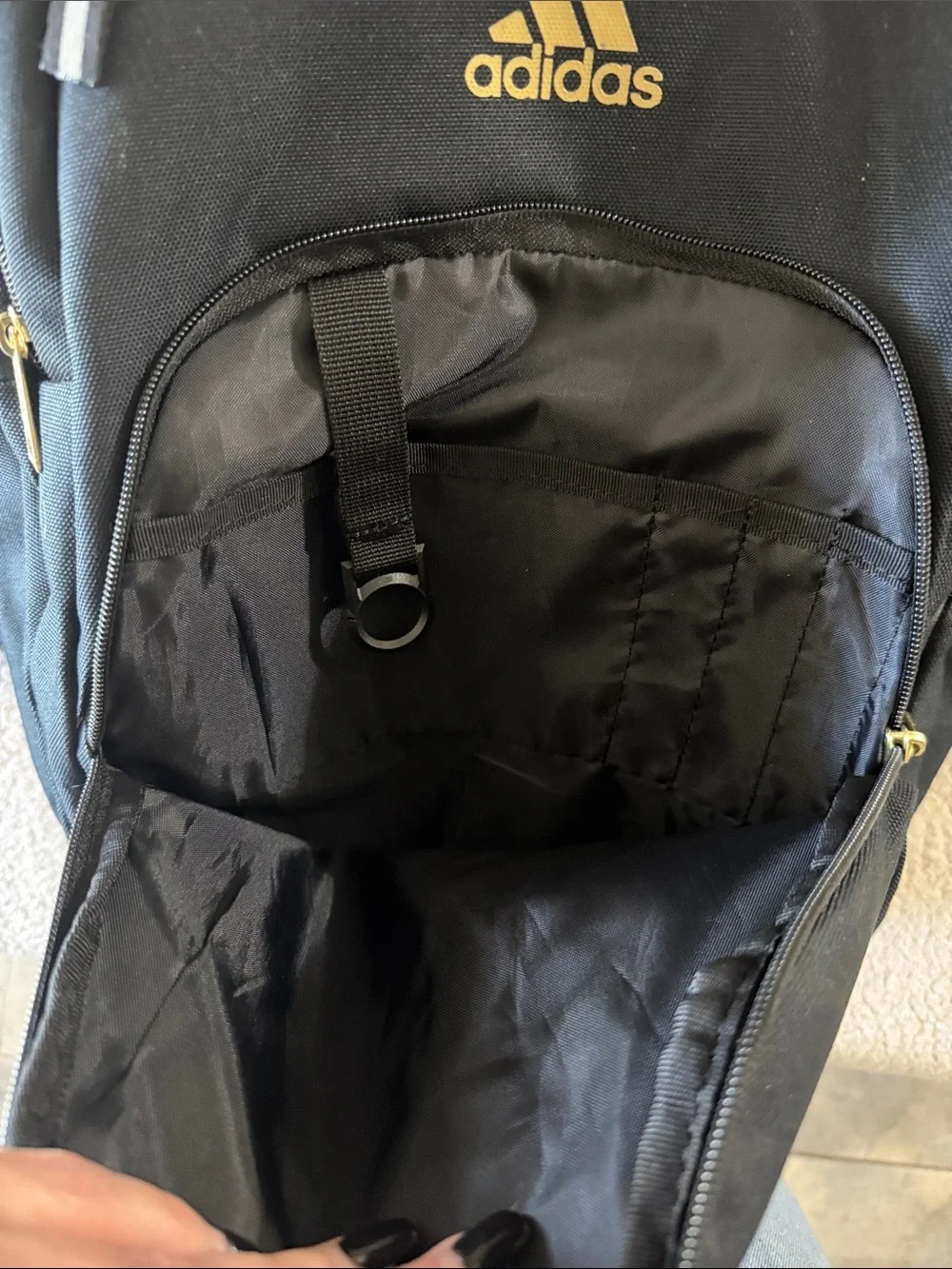 adidas Black Backpack with Gold Logo and Zippers